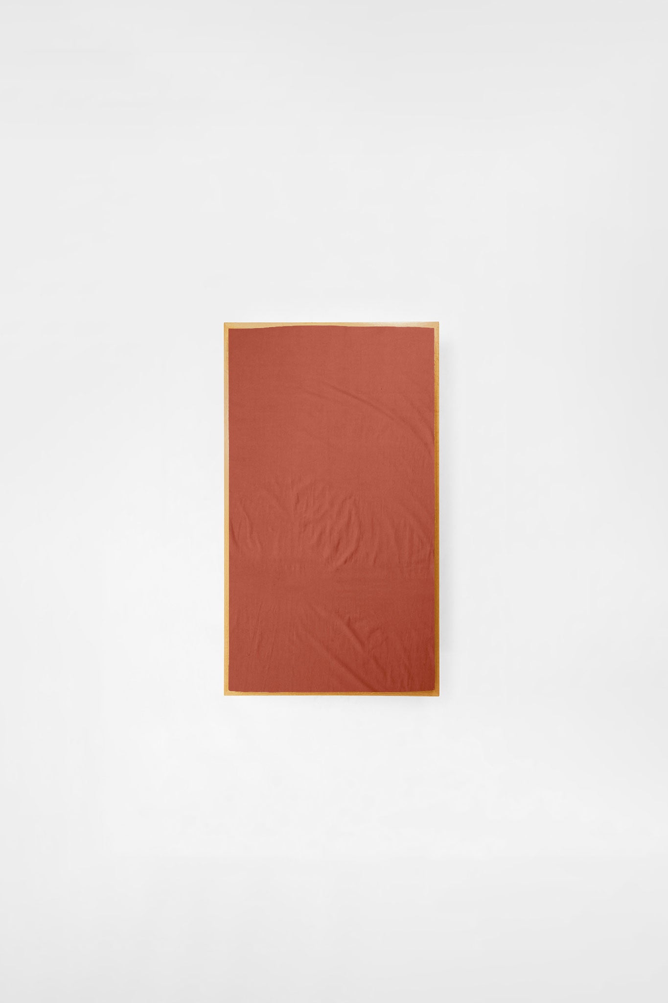 Cot Sheet in Ochre Red