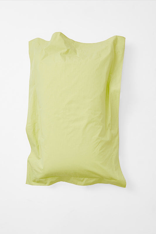 Product Image - Aerial view of single 'sulphur' coloured pillow with lightly ruffled edges.